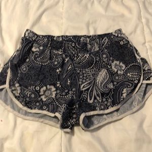 Navy blue and white athletic shorts. Size small.